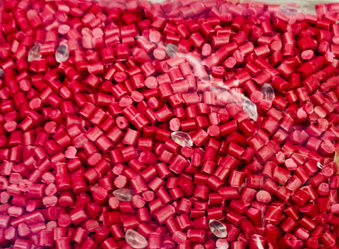 Red Cylindrical and Clear Oval Pellet Mix